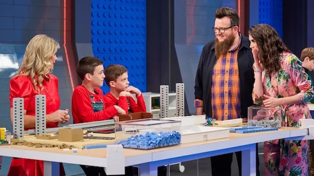 Lego Masters Jr. contestants meet the judges during a construction.