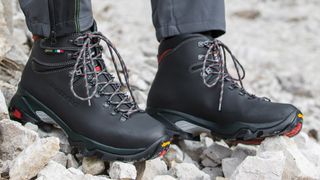Person's feet wearing Zamberlan Vioz GTX hiking boots