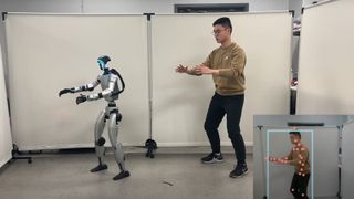 Robot mirroring human.