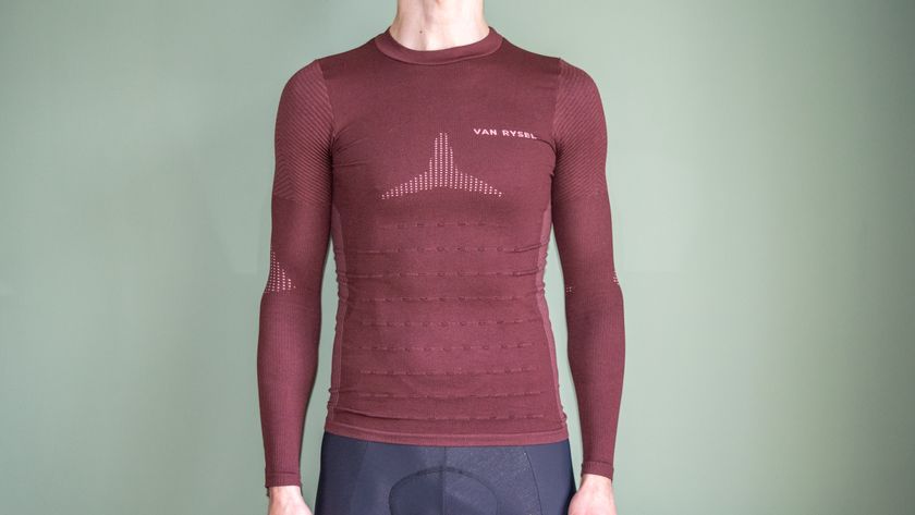 A man wearing the Van Rysel Long Sleeve Racer 2 base layer