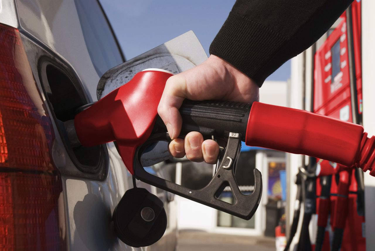 Man refuelling car, close-up