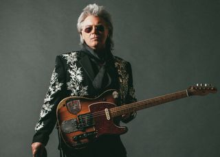 Marty Stuart in a promotional photo from his 2017 album, 'Way Out West.' He's holding "Clarence," one of his most prized possessions. (Photo: Alysse Gafkjen)