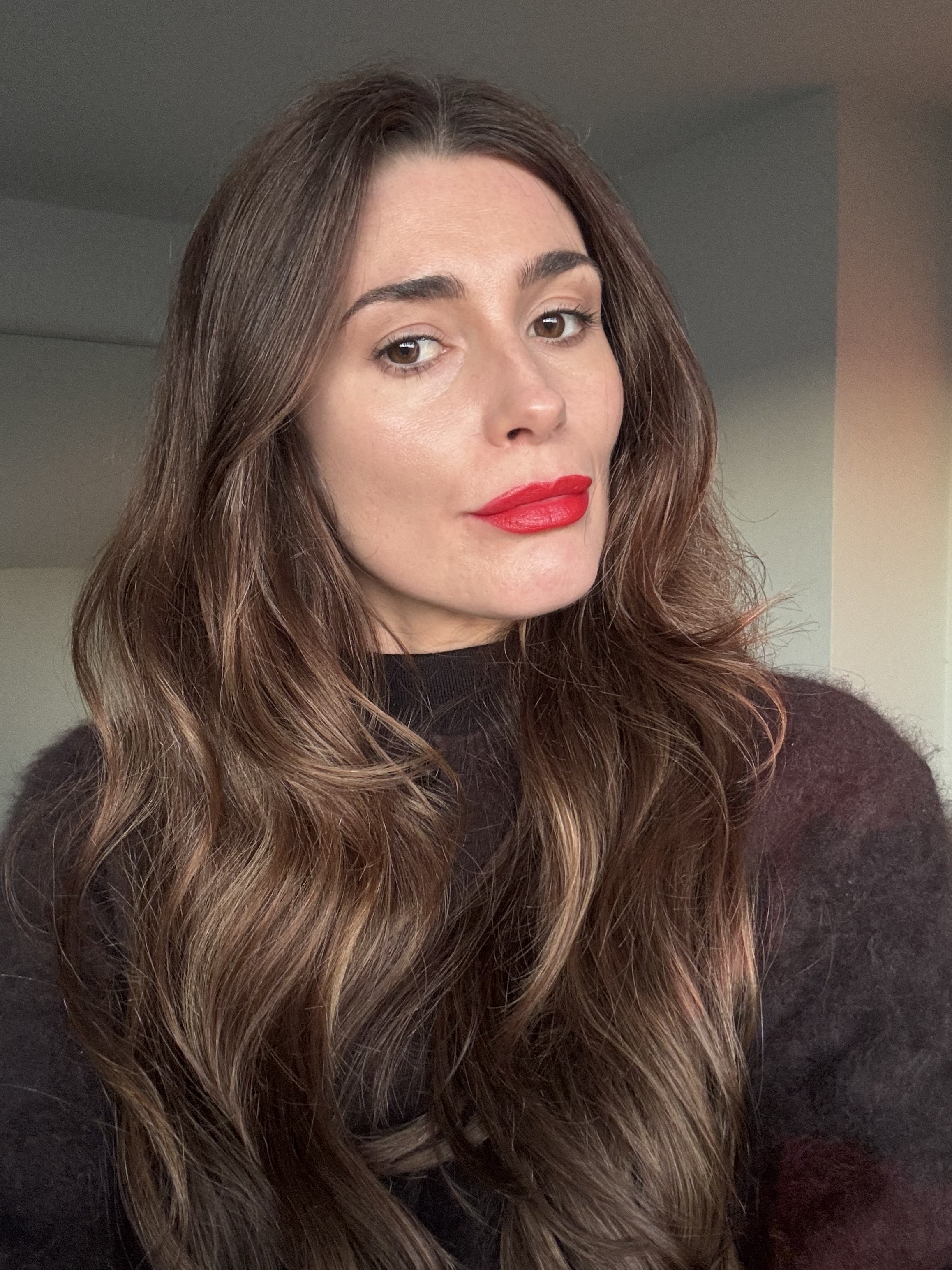 Eleanor wearing Celine lipstick in Rouge Triomphe