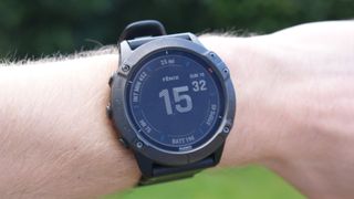 Image shows the Garmin Fenix 6X Pro Solar watch on someone's wrist