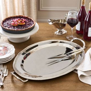 Heritage Silver Oval Turkey Platter on a dining table. 