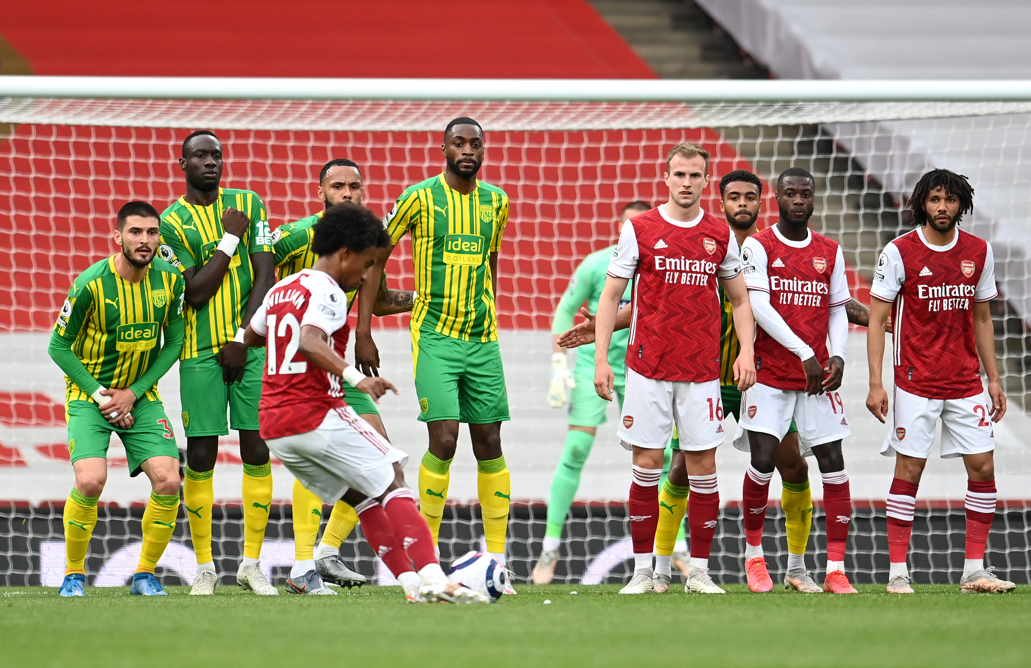 Willian's first Arsenal goal came with a fine last-minute free-kick as the Gunners relegated West Brom.