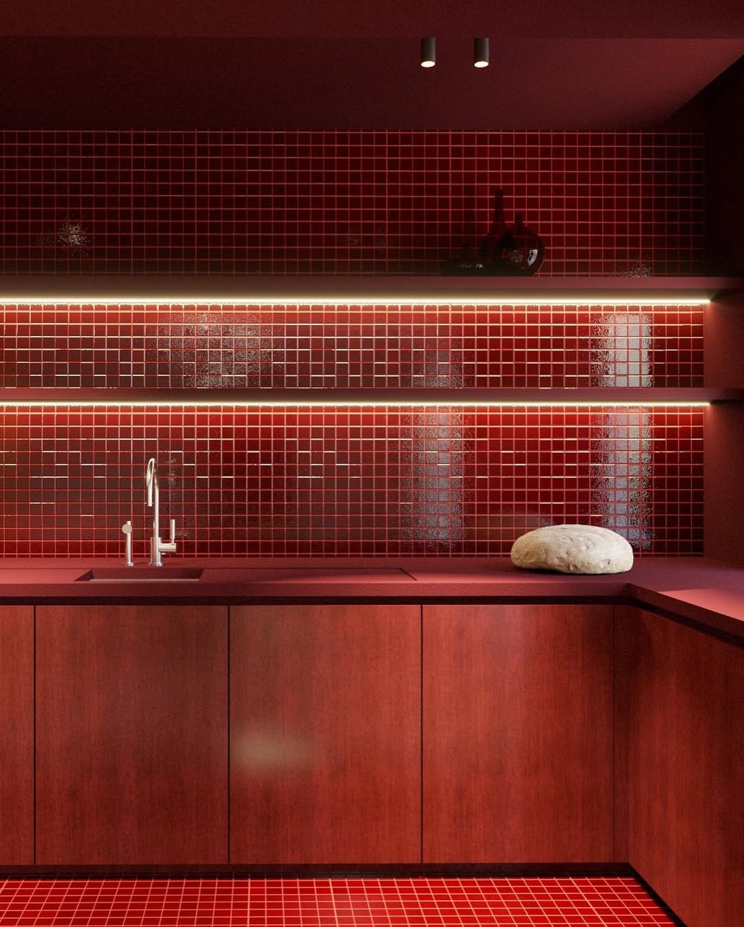 Image of a red kitchen with red countertops, red cabinets, red tile backsplash, and red tile floors.