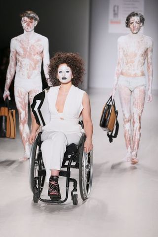 Wheelchair, Style, Fashion, Chest, Trunk, Waist, Fashion model, Fashion design, Costume design, Abdomen,