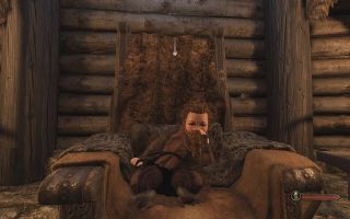 A bearded baby king lounges in a throne in Mount and Blade 2: Bannerlord.