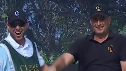 Richard Bland celebrates his hole-in-one with his caddie