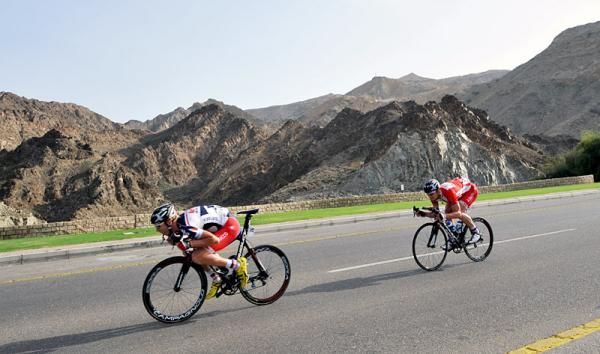 Lotto Belisol's Marcel Sieberg and Andre Greipel fly down a descent.