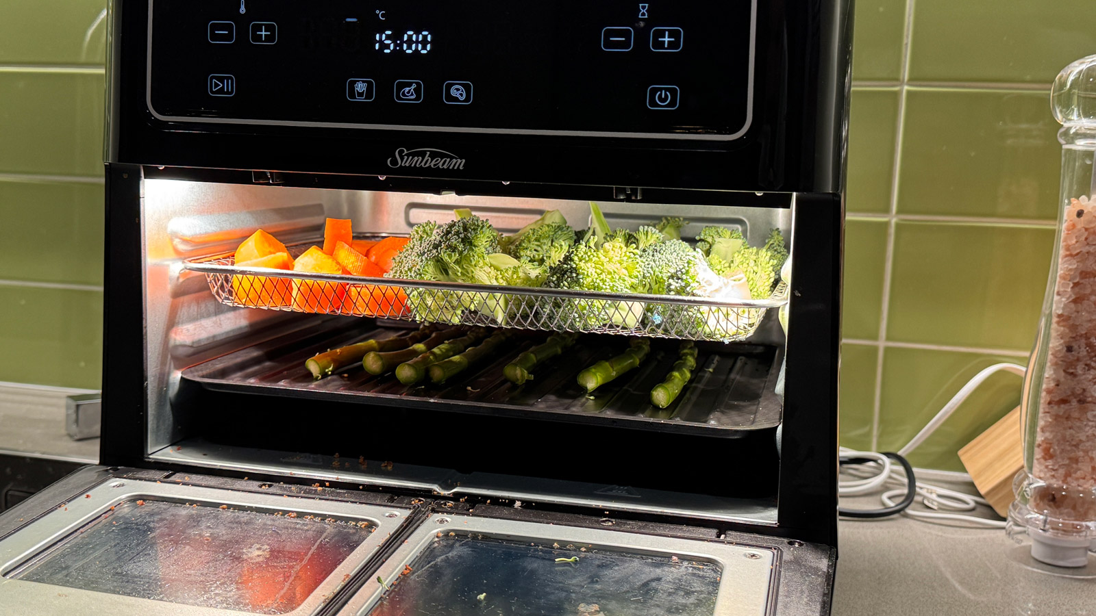 Two trays of vegetables inside the Sunbeam Multi Zone Air Fryer Oven