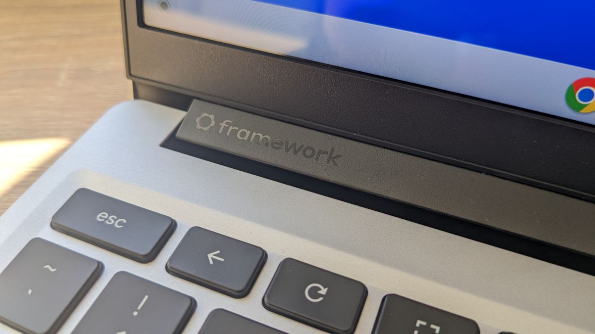 The Framework Laptop Chromebook Edition photographed on a wooden desk.