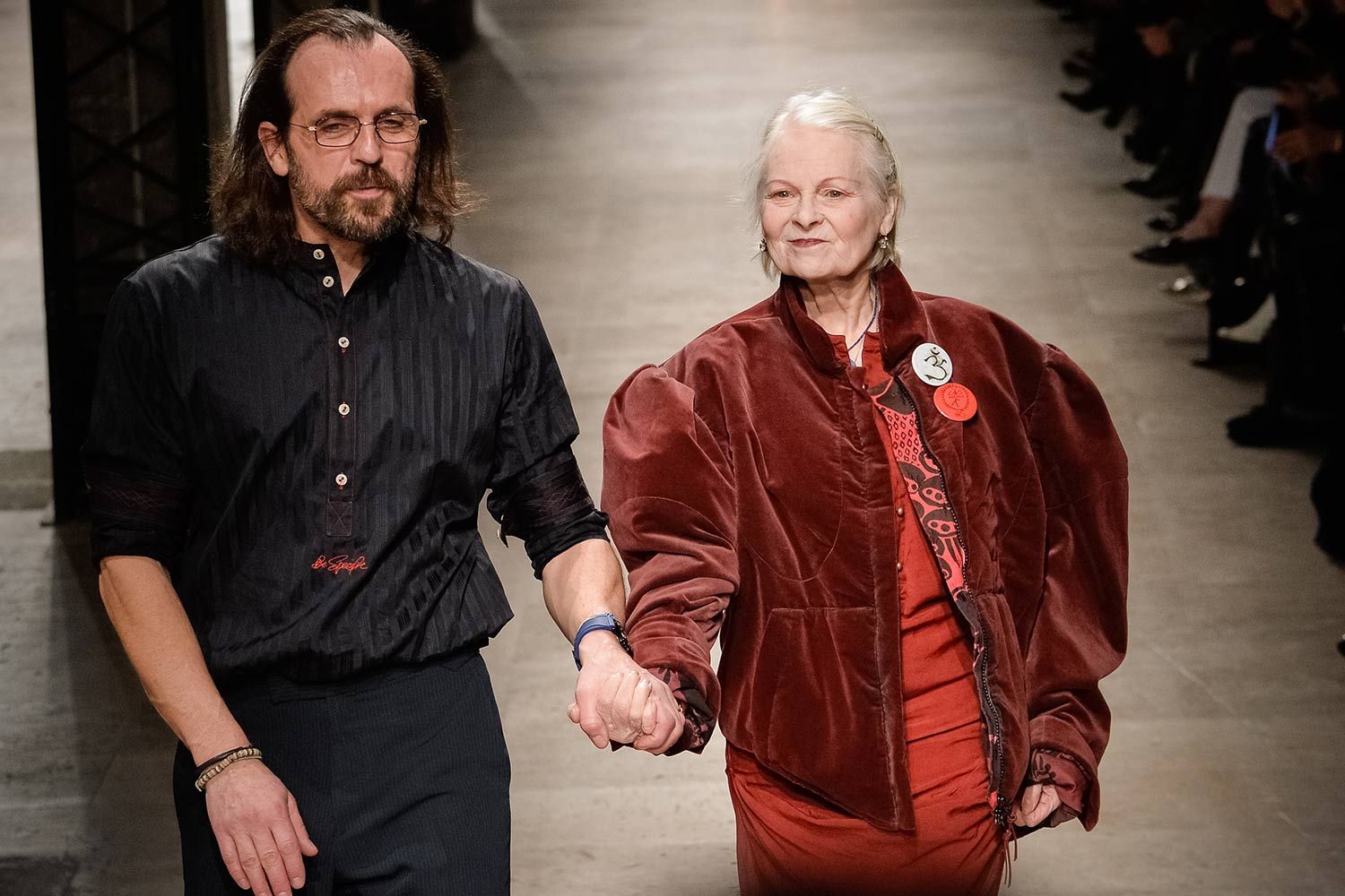 Fashion designer Vivienne Westwood (R) and Andreas Kronthaler acknowledge applause following the Vivienne Westwood show as part of the Paris Fashion Week Womenswear Fall/Winter 2016/2017 on March 5, 2016 in Paris, France