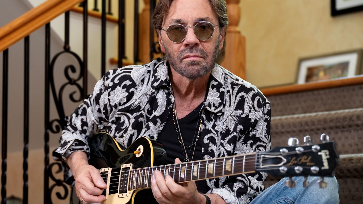 Al Di Meola photographed at home playing his Les Paul Custom, June 2024