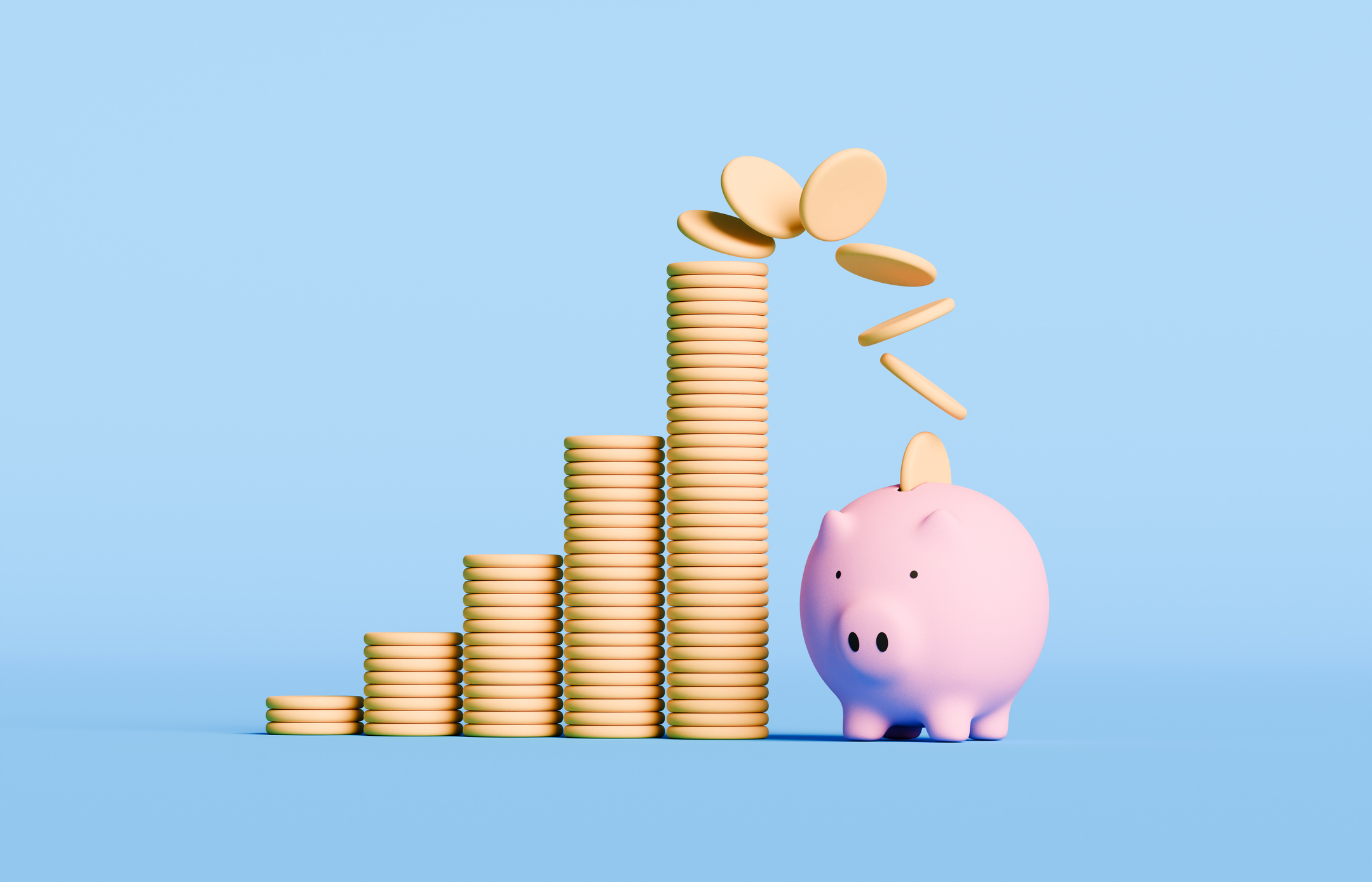 Pieces of the toppling coins are seen falling into a piggy bank 