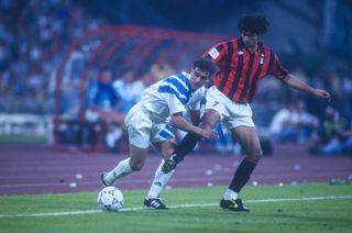 Marseille's Jean-Jacques Eydelie battles with AC Milan's Gianluigi Lentini in the 1993 Champions League final.