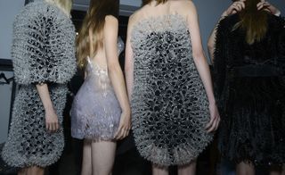 Models wearing three-dimensional structures