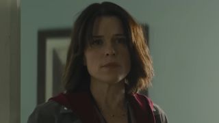 Sydney standing in doorway in Scream 7