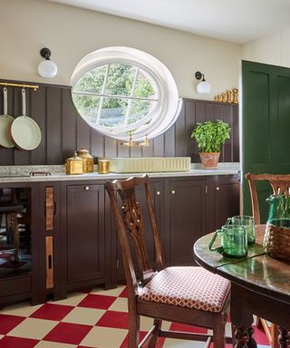 brown kitchen with red checkerboard floor
