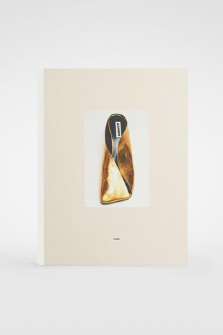 Cover of Jil Sander fashion book with shoe