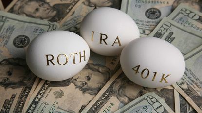 3 eggs with "Rpth," "IRA," and "401K" written on them sitting an a pile of U.S. dollars