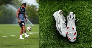 Deandre Yedlin does keepy uppys on the training pitch in white Sokito Scudetta boots