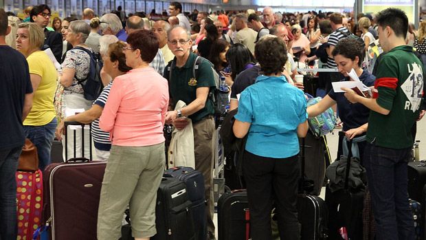 Passengers at Luton Airport waiting to catch their flights after the suspicious item was found 