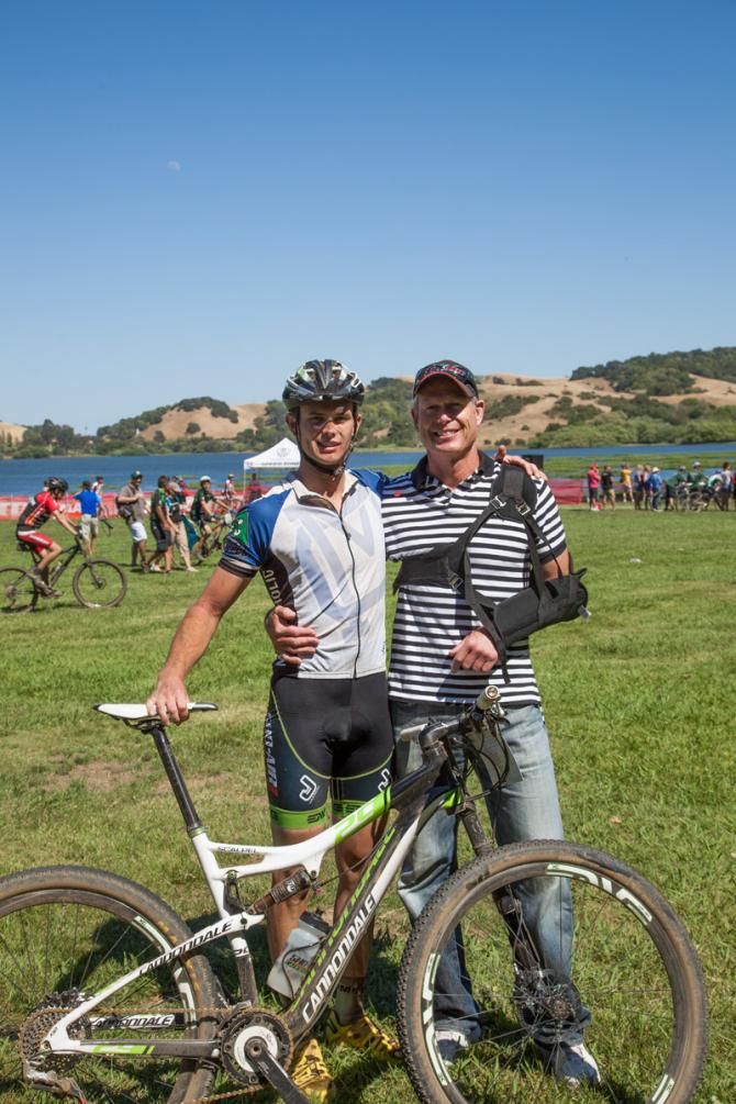 California state champion Taylor Smith poses with his father at Stafford Lake Park.
