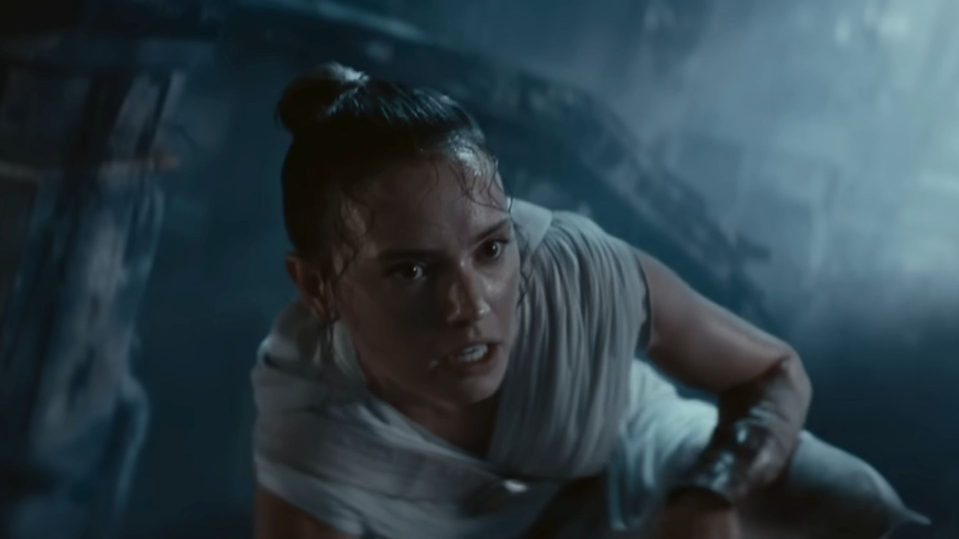 Daisy Ridley as Rey, wearing all white and sweating in Star Wars: The Rise of Skywalker