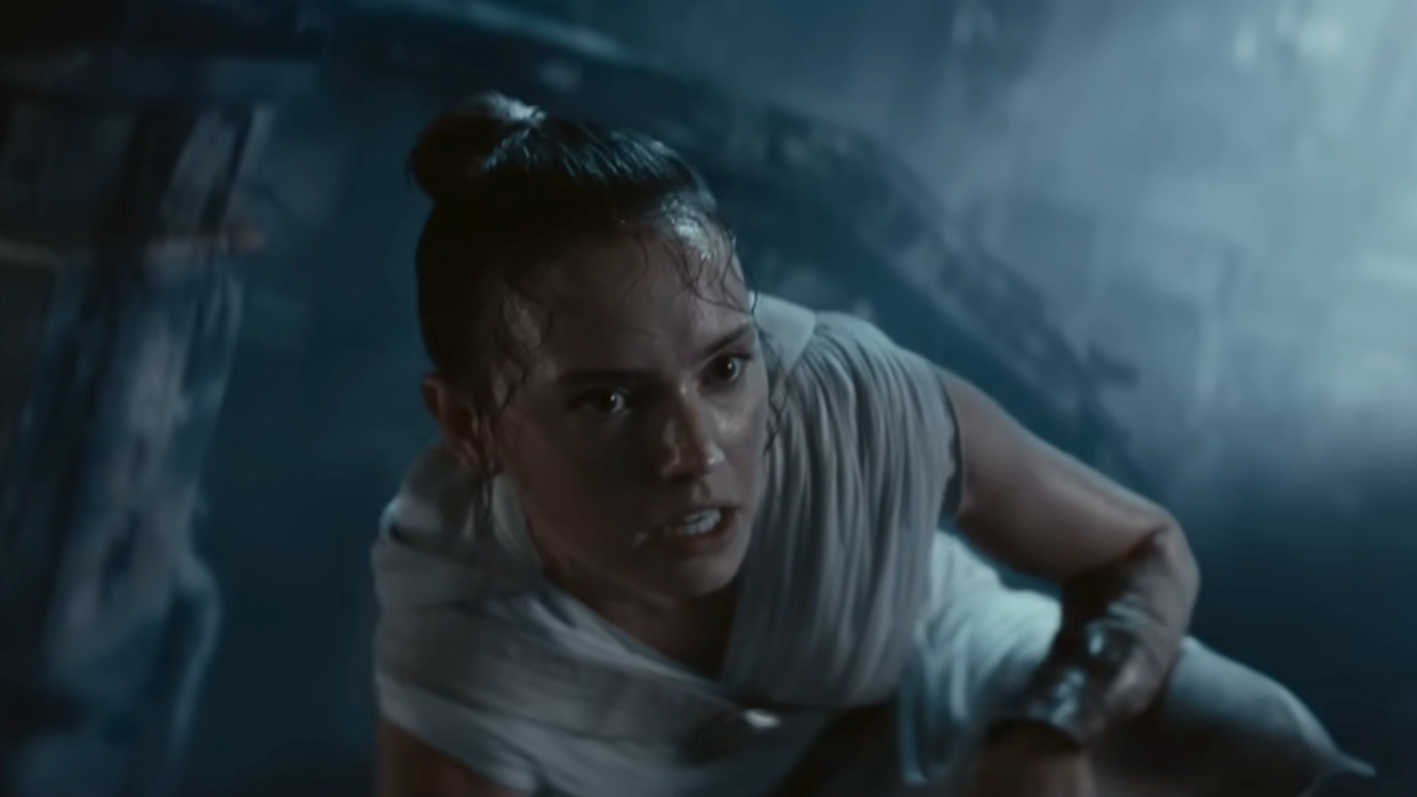 Daisy Ridley as Rey, wearing all white and sweating in Star Wars: The Rise of Skywalker