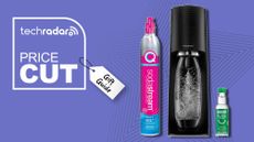 black soda making machine against purple background