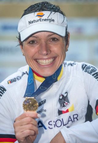 Sabine Spitz (Germany) shows off her bronze medal