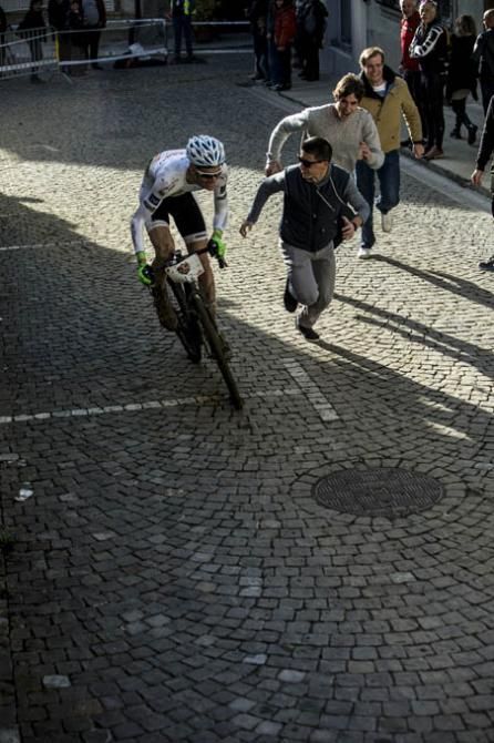 How to feel like a pro, one of the riders is chased by a fan