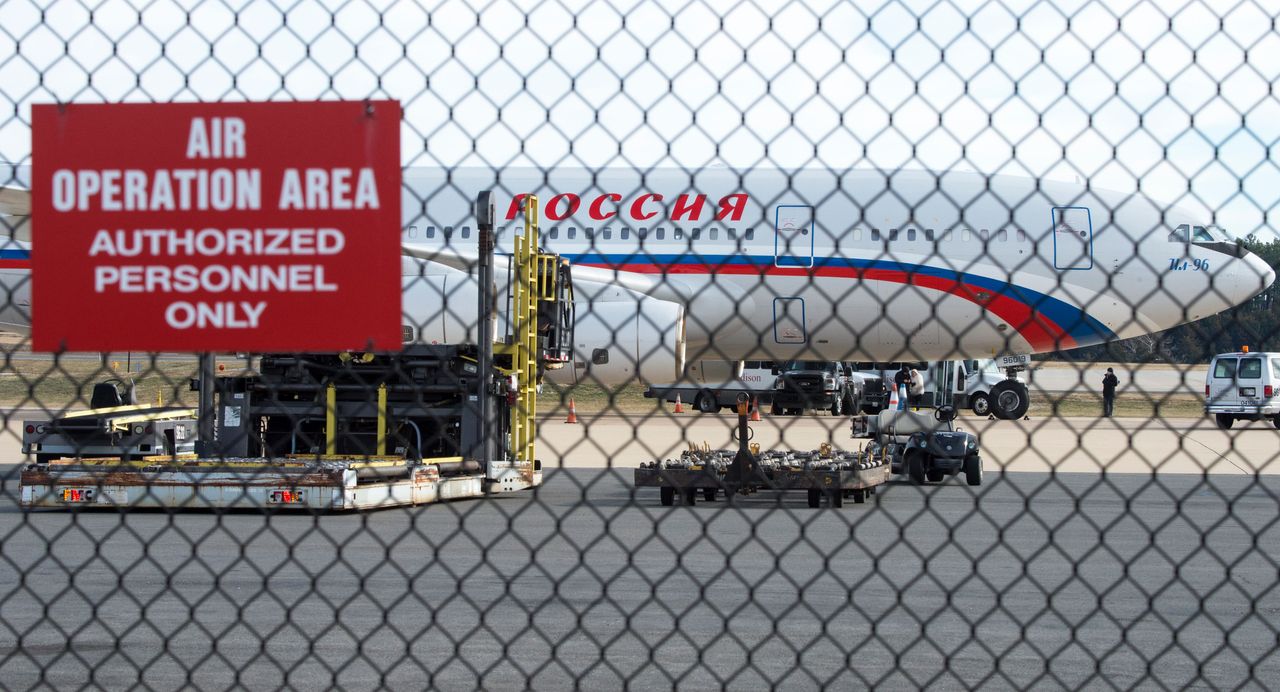 A plane waits to take Russian diplomats out of the U.S.