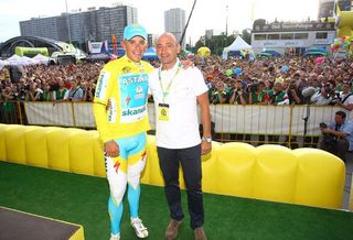Race leader Allan Davis (Astana) with Paolo Bettini. Stage 3 was dedicated to Franco Ballerini and Bettini, the new Italian national team manager, was in attendance.