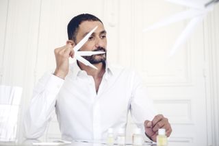 Perfumer Francis Kurkdjian smelling perfume samples