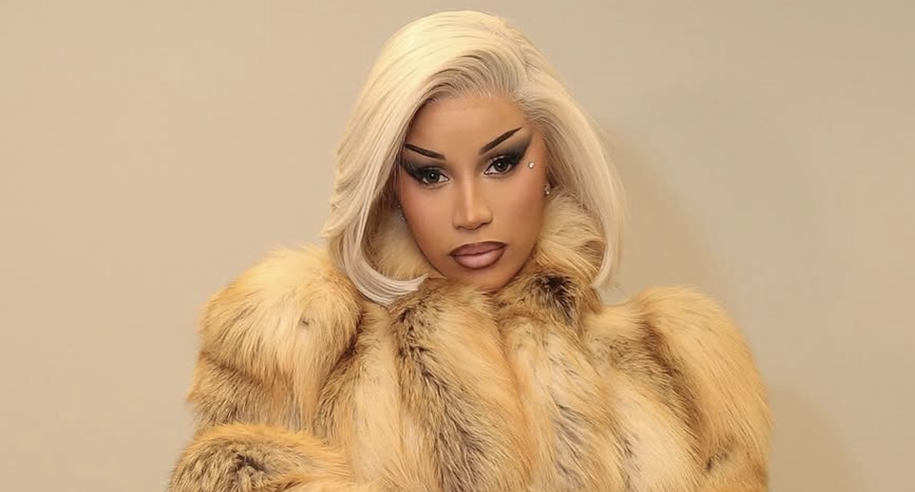 cardi b wears a fur coat and rare john paul gaultier birkin bag
