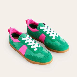 Green suede trainers with pink accents 