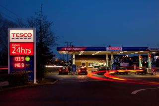 Exterior of Tesco petrol station at night