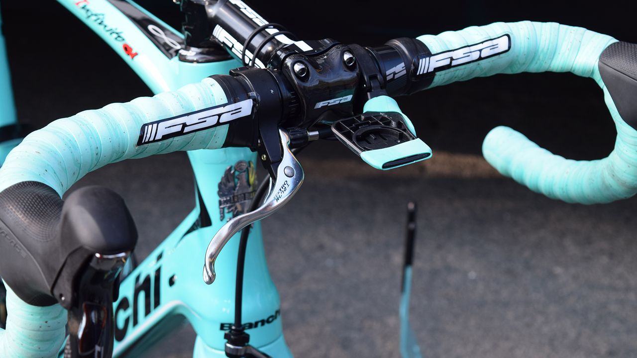 Former cyclo-cross world champion Wout van Aert ran an additional brake lever on the handlebar tops so he can brake while on the handlebar tops