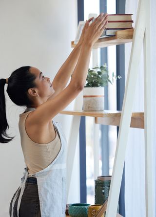 Woman tidying