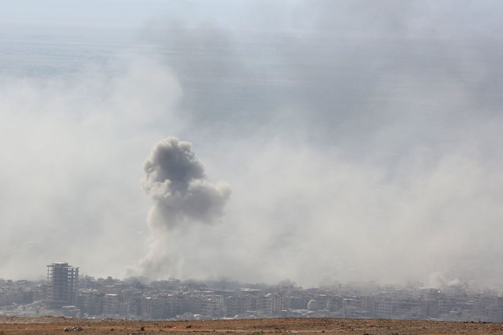 Smoke billows in the town of Douma, the last opposition holdout in Syria&amp;#039;s Eastern Ghouta, on April 7, 2018, after Syrian regime troops resumed a military blitz to pressure rebels to withdraw