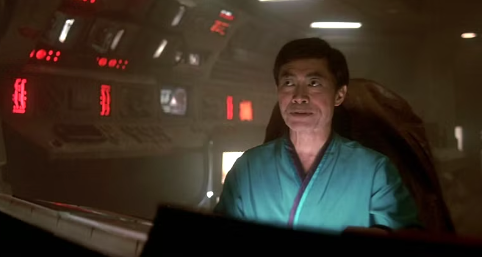 a man flying an alien spaceship in a sci-fi film