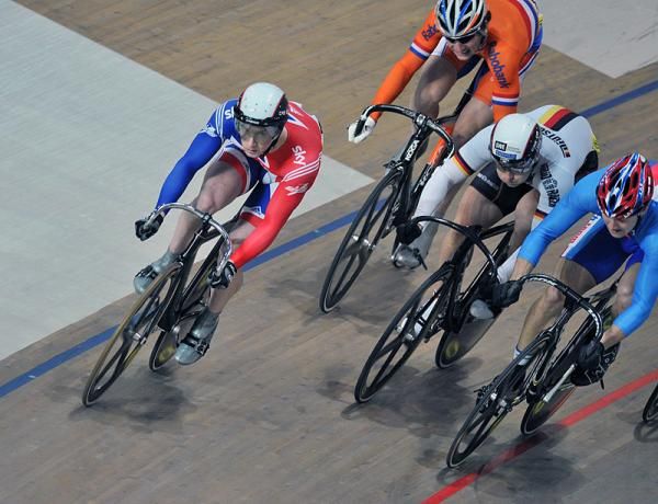 Jason Kenny (Great Britain) won his heat in the first round of the men's keirin.