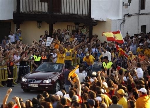 Contador views the crowds from a balcony in his hometown of Pinto.