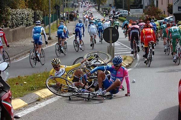 Some riders take a tumbel during the day's 242 kilometre race.