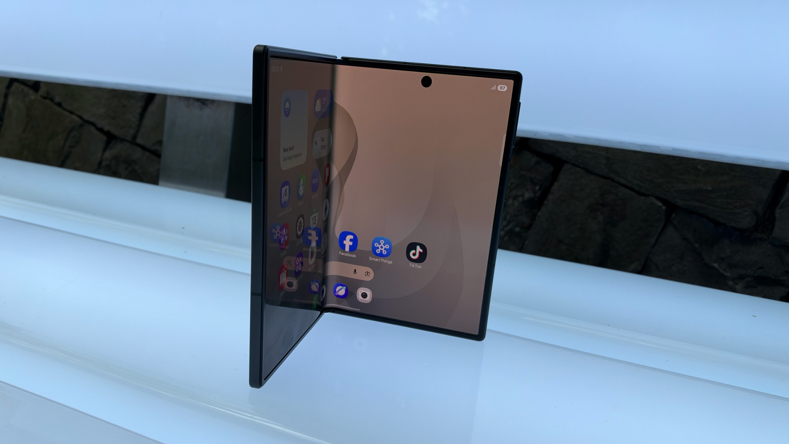 The Samsung Galaxy Z Fold 8 on a bench