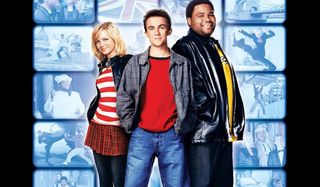 Agent Cody Banks 2: Destination London Hannah Spearritt, Frankie Muniz, and Anthony Anderson in front of a bank of video monitors