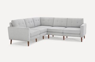 A grey L-shaped sectional sofa
